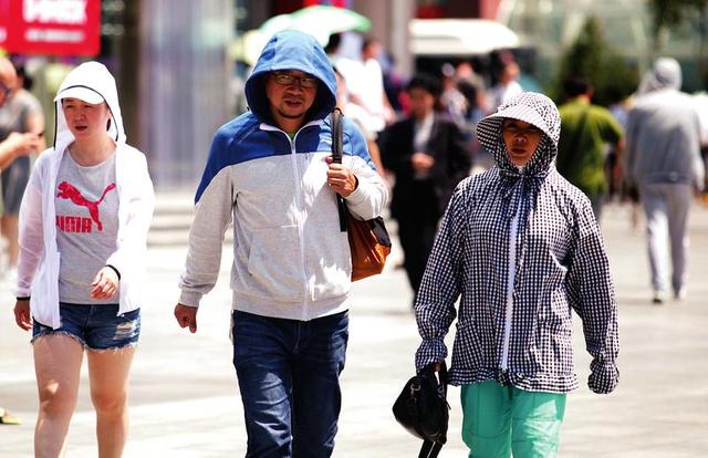 西安高温预警升级还要热三天 16日起雨水来消暑